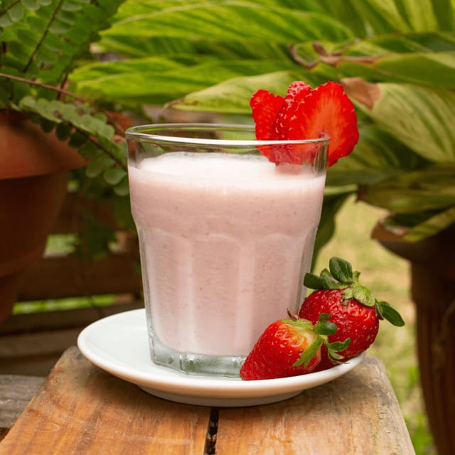 Fresh strawberry-vanilla ice milkshake.